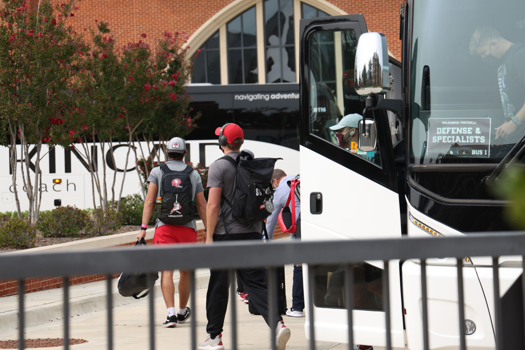 Football players off bus